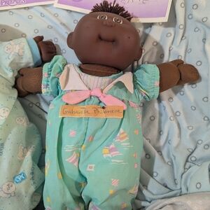 Cabbage Patch Kids Dark Brown Baby Doll in Mint Outfit